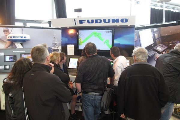 Boating enthusiasts check out the Furuno marine electronics at the Auckland On Water Boat Show.